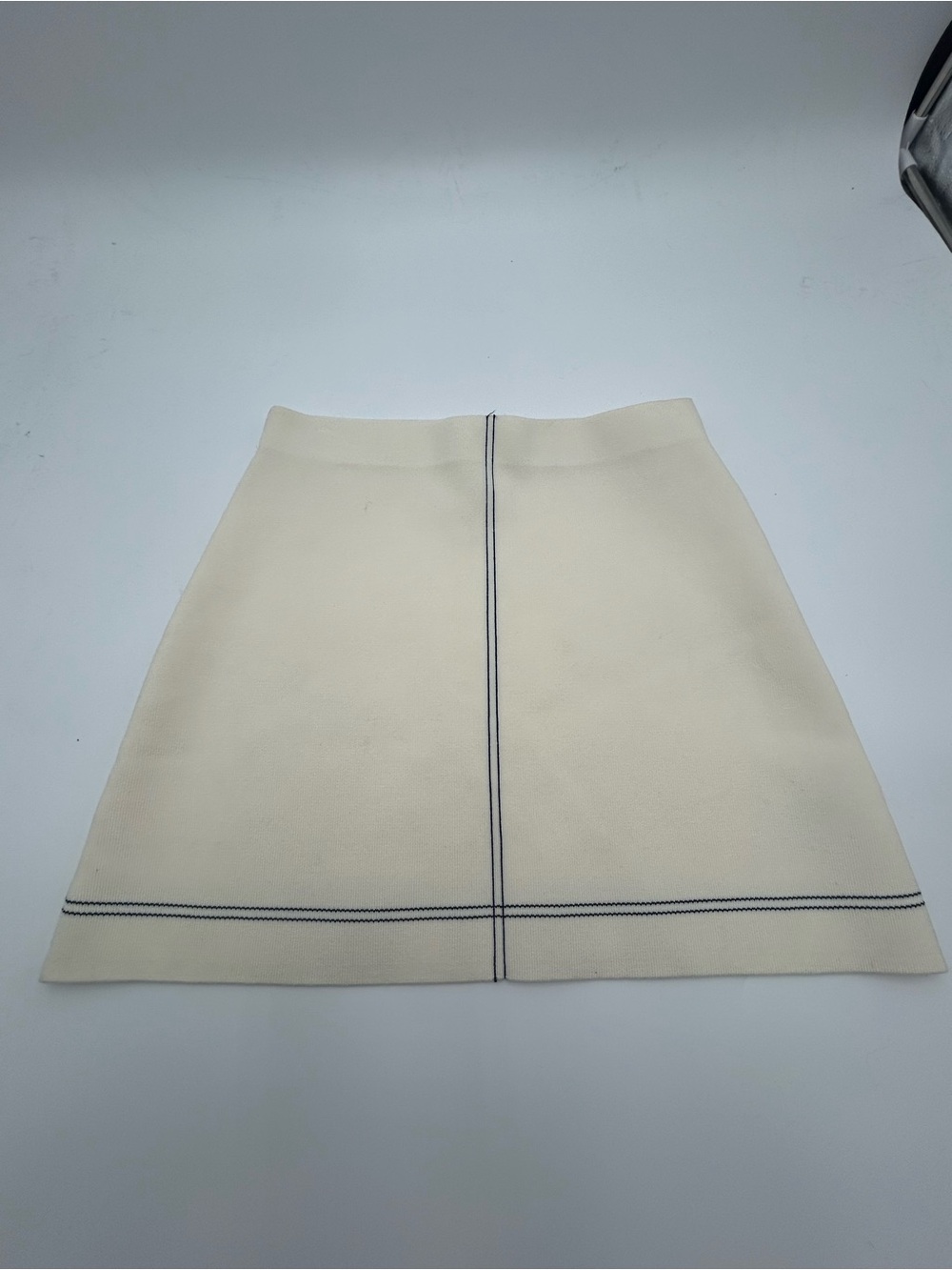 Zara cream mini skirt with black stitching, size Small